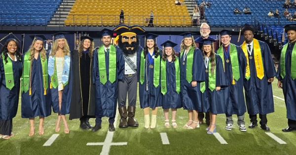 2025 Fall Graduates with Bucky