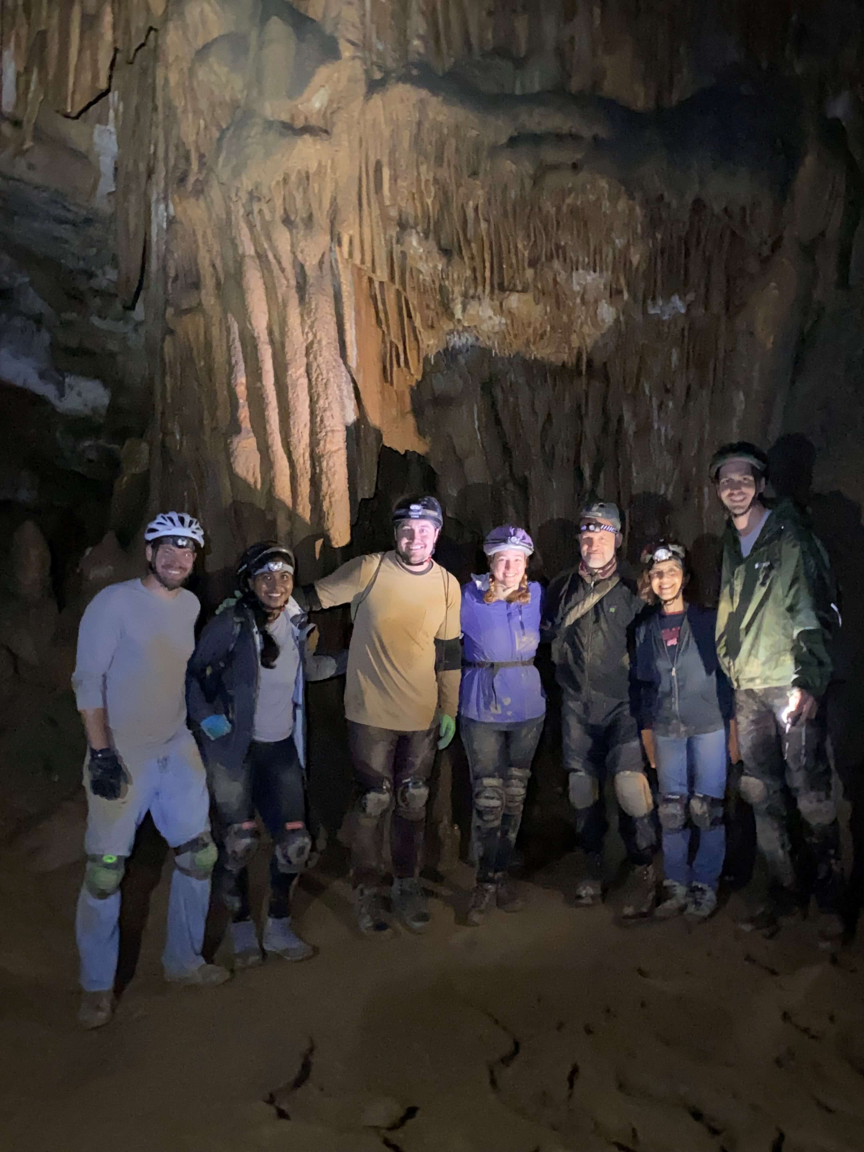 Spelunking Group in Cave.