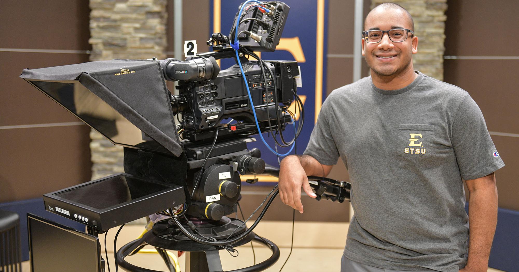 Anthony Salas stands in the ETSU film studio