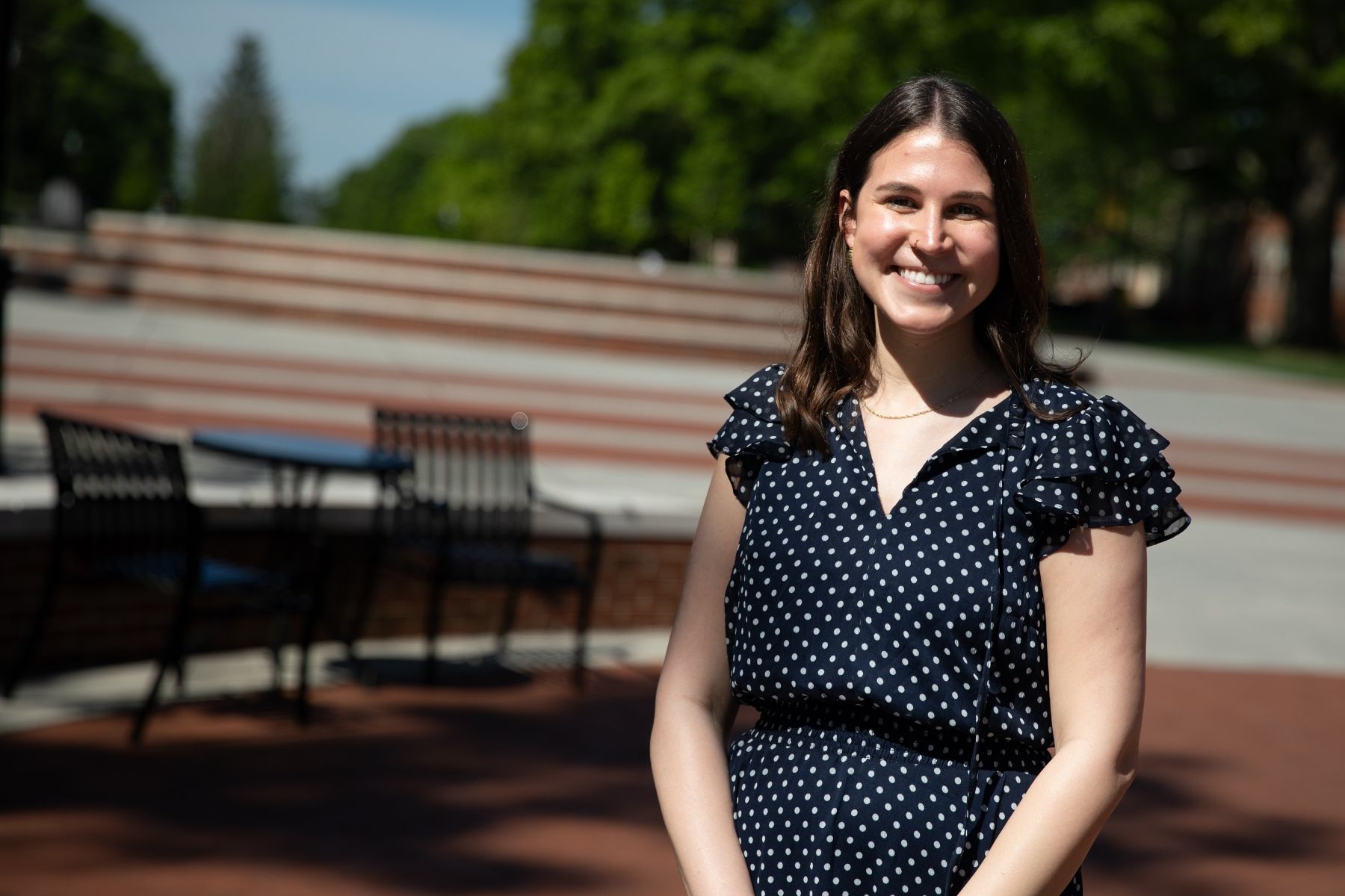 Allyson Parks, Sport Management graduate poses in the Campus Commons at ETSU.