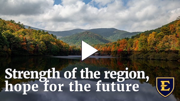 YouTube thumbnail depicting a lake and the Appalachian Mountains. The text reads "Strength of the region, hope for the future.""